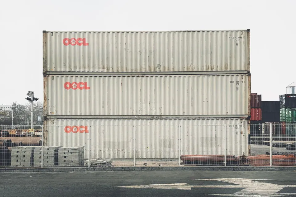 Stacked shipping containers at a cargo yard
