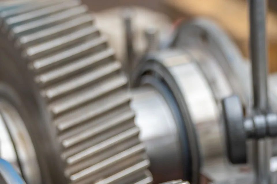 Close-up of metal gears and machine components