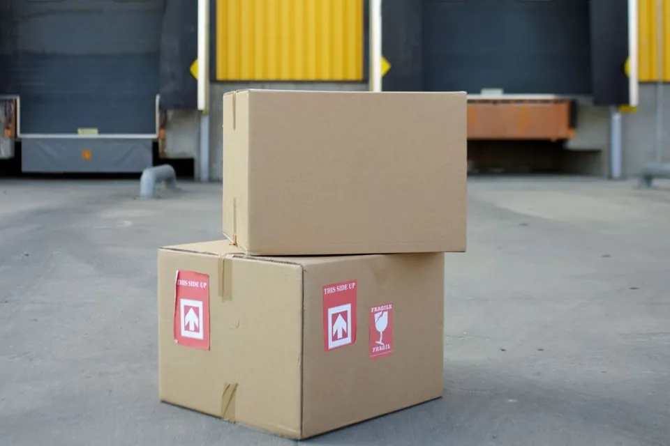 Cardboard boxes near warehouse loading doors